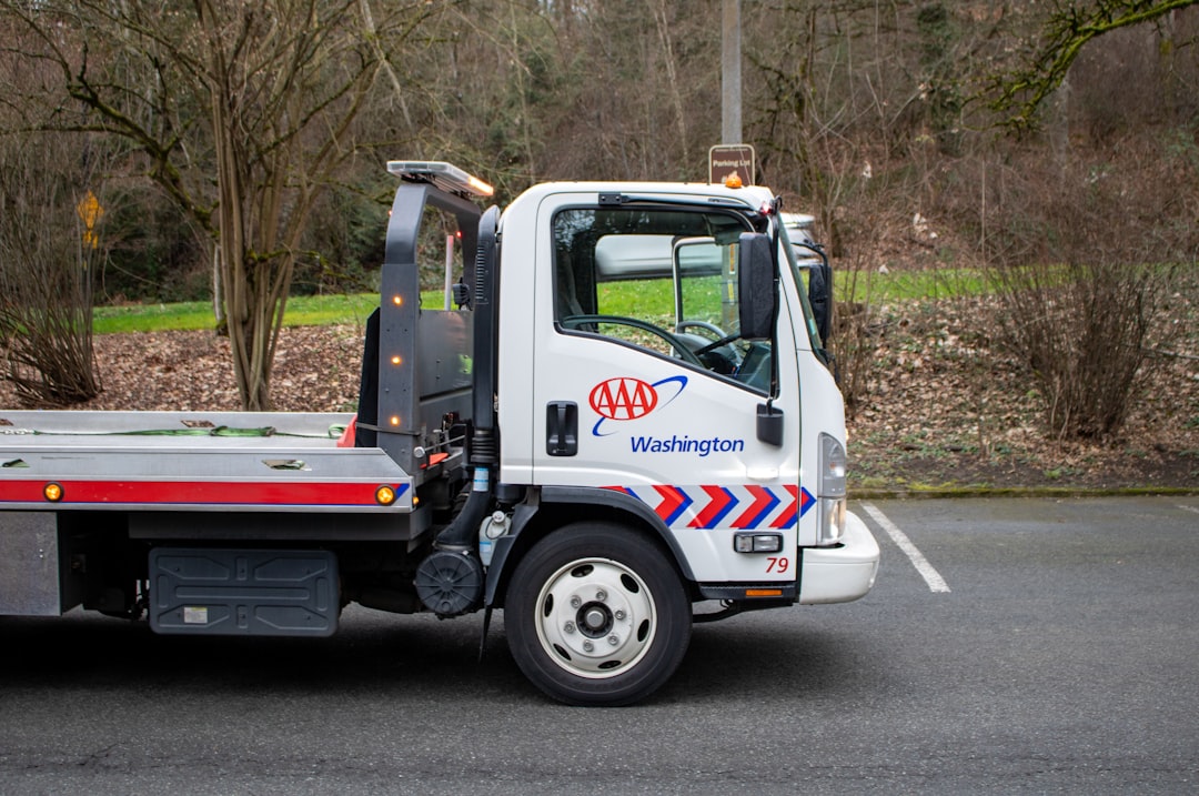 A white AAA tow truck.